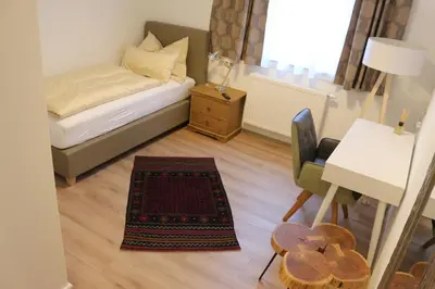 Ein Bett oder Betten in einem Zimmer der Unterkunft Gasthof Eckberg
