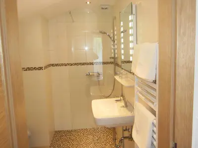 Ein Badezimmer in der Unterkunft Pension Salzburger Hof