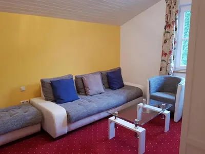 Ein Sitzbereich in der Unterkunft Pension Salzburger Hof