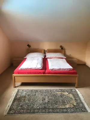 Ein Bett oder Betten in einem Zimmer der Unterkunft Schangri-la