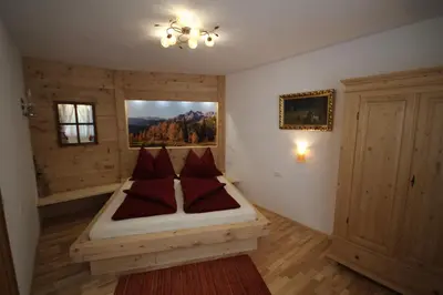 Ein Bett oder Betten in einem Zimmer der Unterkunft Oberharreithhof