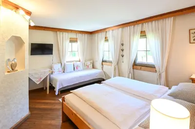 Ein Bett oder Betten in einem Zimmer der Unterkunft Auerhof