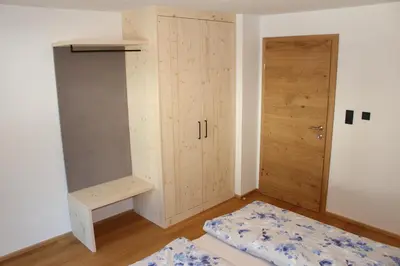 Ein Bett oder Betten in einem Zimmer der Unterkunft Ferienhaus Gschwandtl