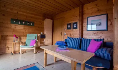 Ein Sitzbereich in der Unterkunft Chalets Ebner