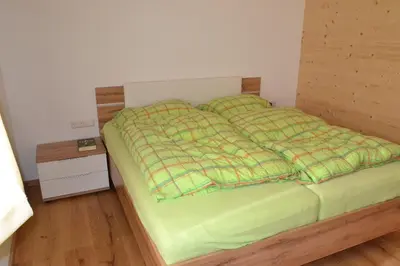 Ein Bett oder Betten in einem Zimmer der Unterkunft Talhütte App.2