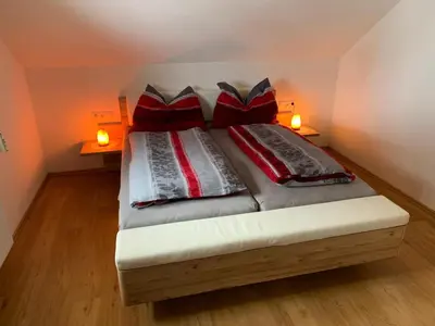 Ein Bett oder Betten in einem Zimmer der Unterkunft Hochkirg Lehen