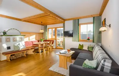 Ein Sitzbereich in der Unterkunft Linharterhof Appartement