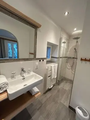 Ein Badezimmer in der Unterkunft gartenhouse