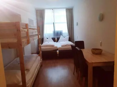 Ein Bett oder Betten in einem Zimmer der Unterkunft Econnomy Adler