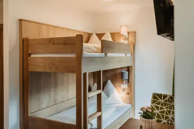 Ein Bett oder Betten in einem Zimmer der Unterkunft DAS 