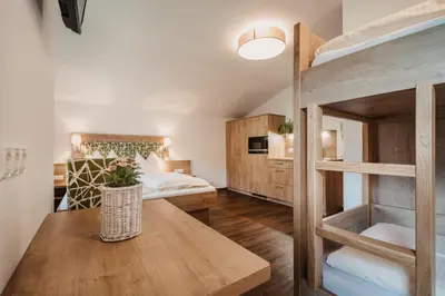 Ein Bett oder Betten in einem Zimmer der Unterkunft DAS 