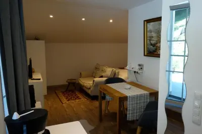 Ein Sitzbereich in der Unterkunft Haus Fuchs