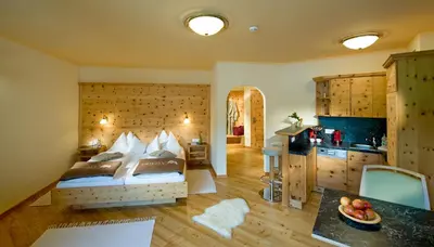 Ein Bett oder Betten in einem Zimmer der Unterkunft Grizzly Sport & Motorrad Resort