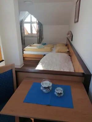 Ein Bett oder Betten in einem Zimmer der Unterkunft Jugendgästehaus Tauernruh