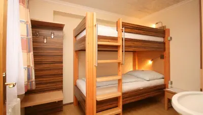 Ein Bett oder Betten in einem Zimmer der Unterkunft Apartment Alpenperle
