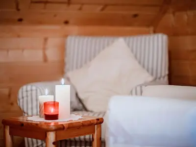 Ein Bett oder Betten in einem Zimmer der Unterkunft Chalet Simons Blockhütte by Interhome