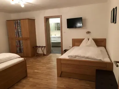 Ein Bett oder Betten in einem Zimmer der Unterkunft Appartementhaus Schütter