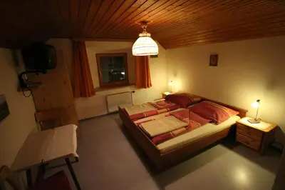 Ein Bett oder Betten in einem Zimmer der Unterkunft Ferienwohnung Krennbauer