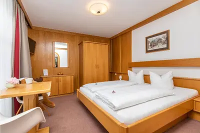 Ein Bett oder Betten in einem Zimmer der Unterkunft Haus Deutinger