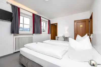 Ein Bett oder Betten in einem Zimmer der Unterkunft Haus Deutinger