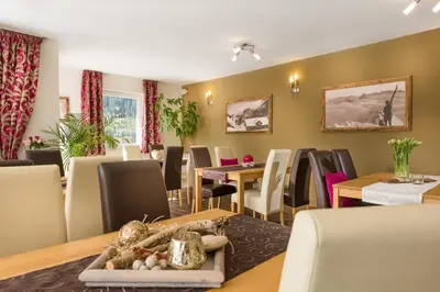 Ein Sitzbereich in der Unterkunft Appartements Zahnleiten