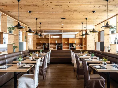 Ein Restaurant oder anderes Speiselokal in der Unterkunft Falkensteiner Hotel Schladming l 4 Star Superior