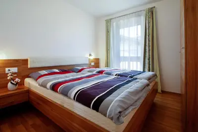 Ein Bett oder Betten in einem Zimmer der Unterkunft Haus Bergsonne