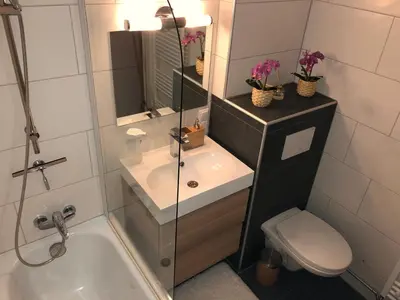 Ein Badezimmer in der Unterkunft Wohlfühlapartment Dachsteinblick