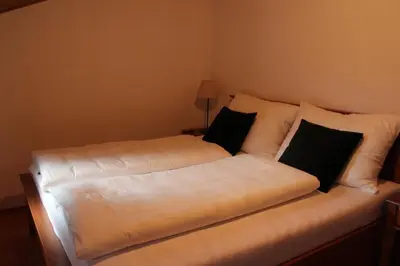 Ein Bett oder Betten in einem Zimmer der Unterkunft Appartement Emilia
