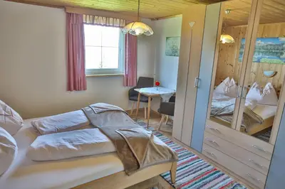 Ein Bett oder Betten in einem Zimmer der Unterkunft Buchmann Lehen