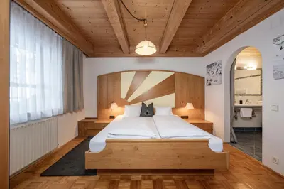 Ein Bett oder Betten in einem Zimmer der Unterkunft AUSTRIA APPART - natural Lifestyle Appartements auf der Piste