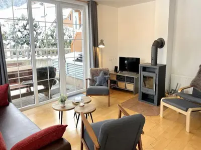 Ein Sitzbereich in der Unterkunft Apartment by the ski slope