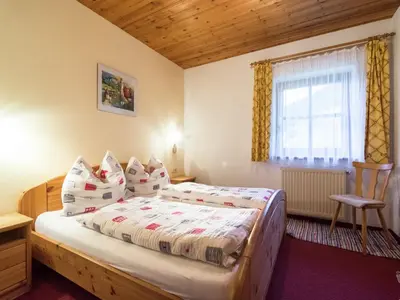 Ein Bett oder Betten in einem Zimmer der Unterkunft Apartment in Wagrain with Stunning Mountain Views