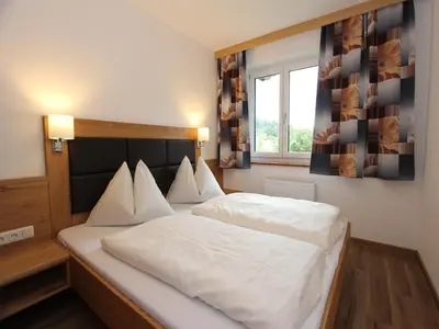 Ein Bett oder Betten in einem Zimmer der Unterkunft Apartment in Sankt Johann near Ski Area