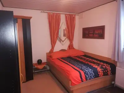 Ein Bett oder Betten in einem Zimmer der Unterkunft Haus Chrissy