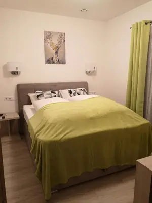 Ein Bett oder Betten in einem Zimmer der Unterkunft Schneekristall