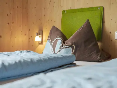 Ein Bett oder Betten in einem Zimmer der Unterkunft Chalet in Hohentauern am Skilift