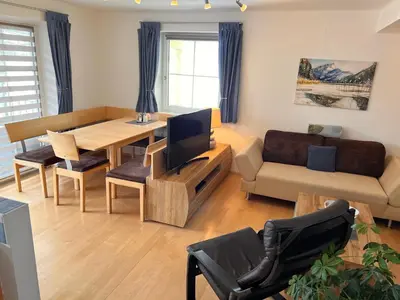 Ein Sitzbereich in der Unterkunft Apartment Gimpl