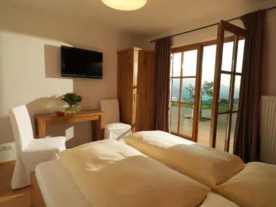 Ein Bett oder Betten in einem Zimmer der Unterkunft Stallerhof