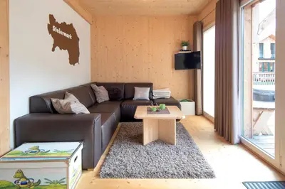 Ein Sitzbereich in der Unterkunft Hirsch Chalet