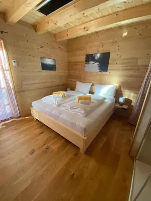 Ein Bett oder Betten in einem Zimmer der Unterkunft Almhütte