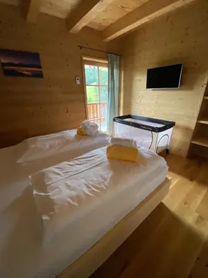 Ein Bett oder Betten in einem Zimmer der Unterkunft Almhütte