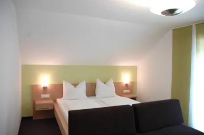 Ein Bett oder Betten in einem Zimmer der Unterkunft Apartments Reiterbäck