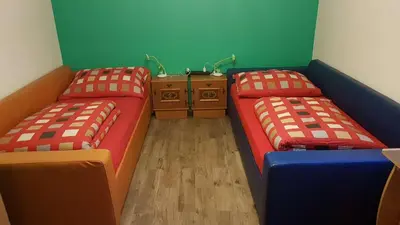 Ein Bett oder Betten in einem Zimmer der Unterkunft Apartment Holiday Lungötz