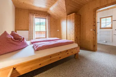 Ein Bett oder Betten in einem Zimmer der Unterkunft Almliesl SCHO-530