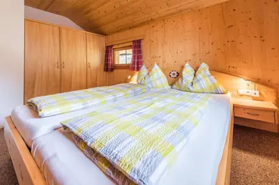 Ein Bett oder Betten in einem Zimmer der Unterkunft Almliesl SCHO-530