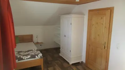Ein Bett oder Betten in einem Zimmer der Unterkunft Casa Emmi