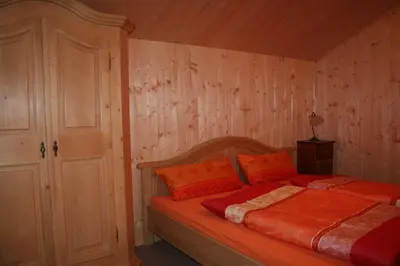 Ein Bett oder Betten in einem Zimmer der Unterkunft Alpenferienhaus Dachstein-West