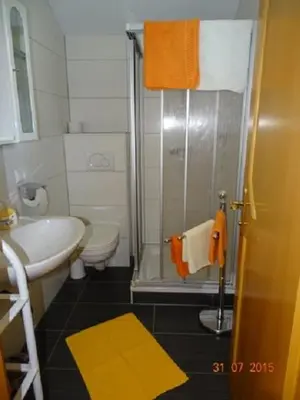 Ein Badezimmer in der Unterkunft Pension Strauss