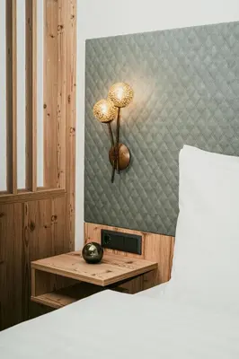 Ein Bett oder Betten in einem Zimmer der Unterkunft Apparthotel Samson